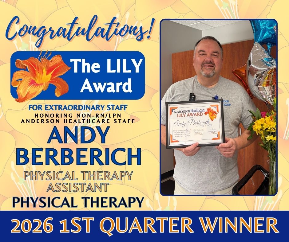 A smiling man holds a framed certificate and stands beside balloons and flowers. Text reads: Congratulations! The LILY Award: Andy Berberich, Physical Therapy Assistant, 2026 1st Quarter Winner, Anderson Healthcare Staff.
