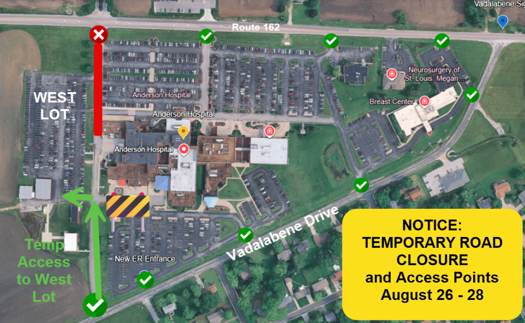 Aerial view of Anderson Hospital with a section of road marked closed in red, detour signs, and a yellow notice about temporary road closure and access points for August 26–28. Green checks show open routes and parking.